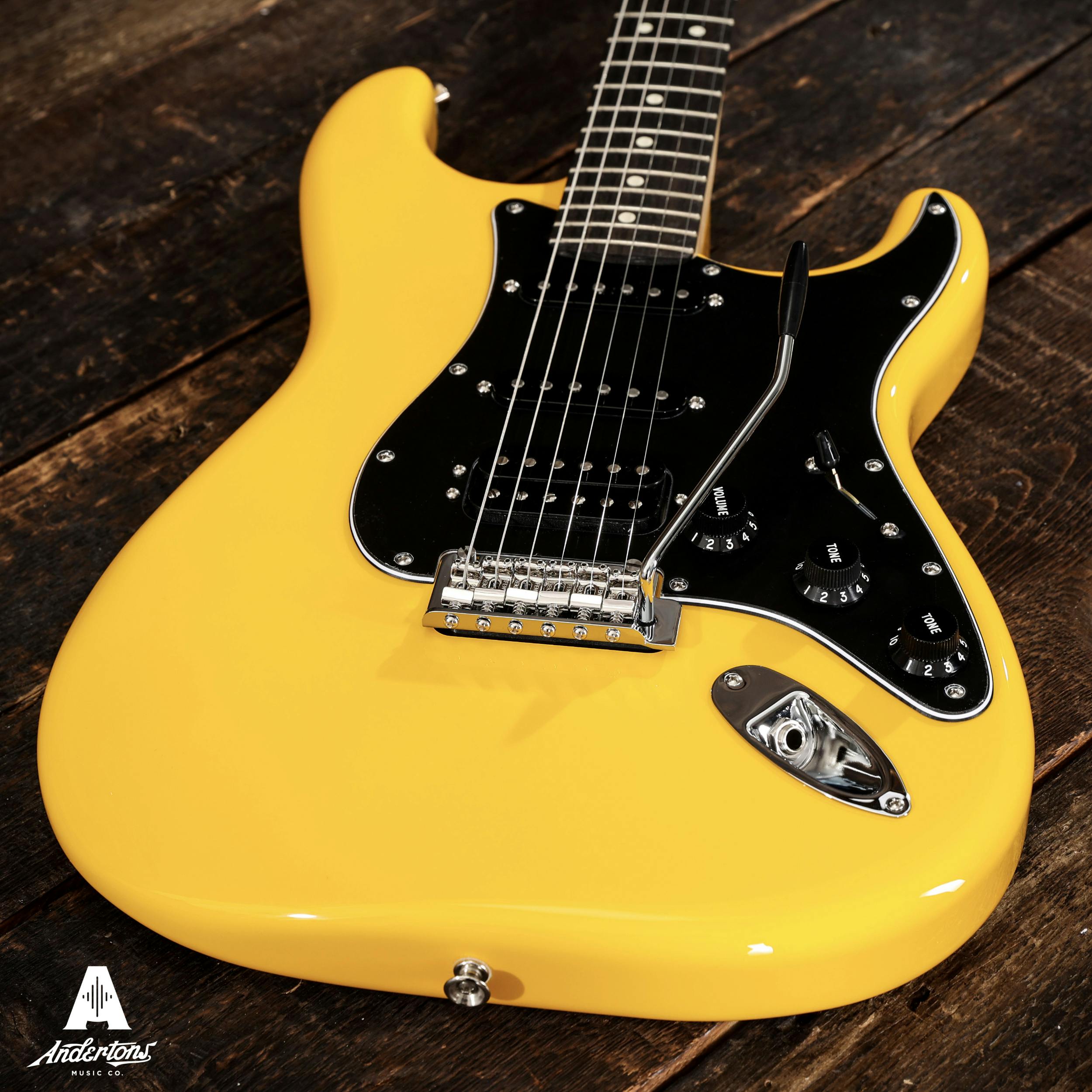 yellow and black stratocaster